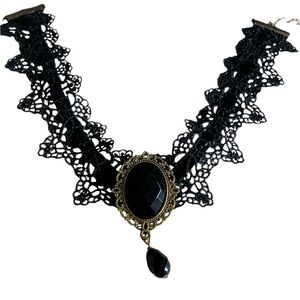 Two black choker necklaces. Gothic, dark academia.